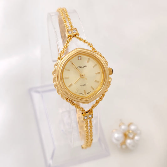 Elegant Allure Womens Quartz Watch In Gold Tone Elegance