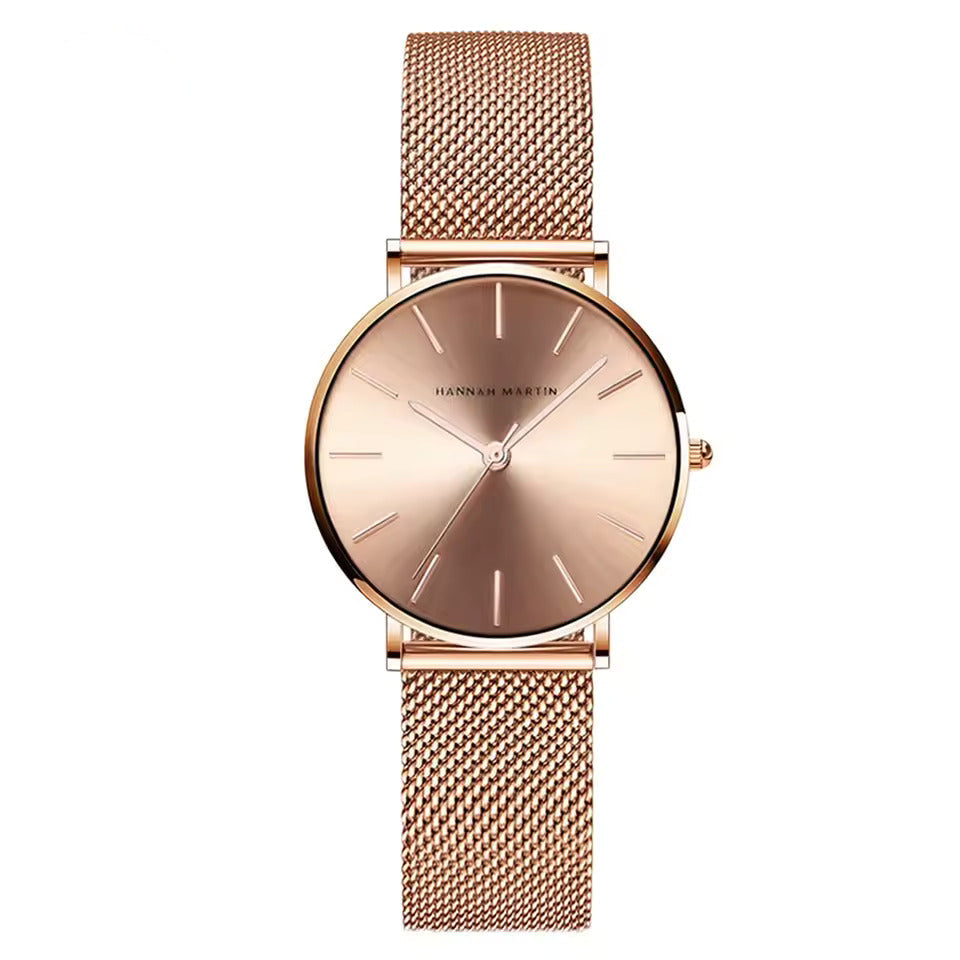 Luxurious Rose Gold Quartz Timepiece Alongside Bracelet
