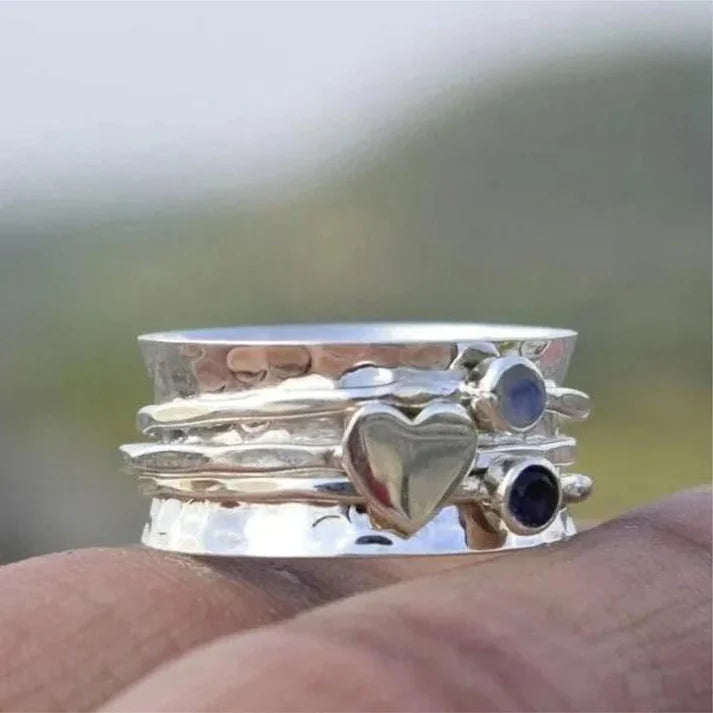 Elegant Heart Rotating Ring in Silver