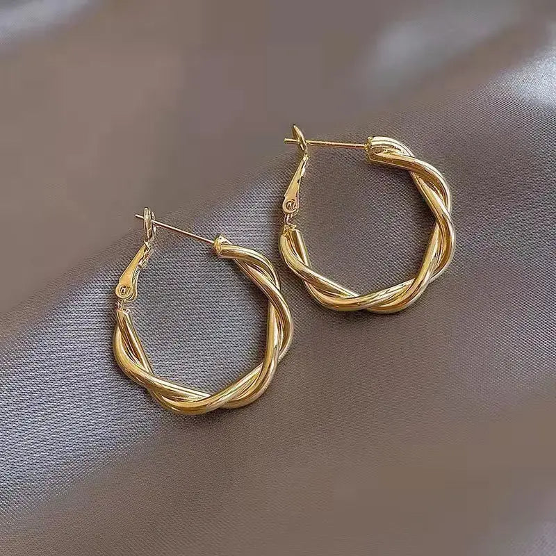 1+1 Offer: Elegant golden knotted earrings
