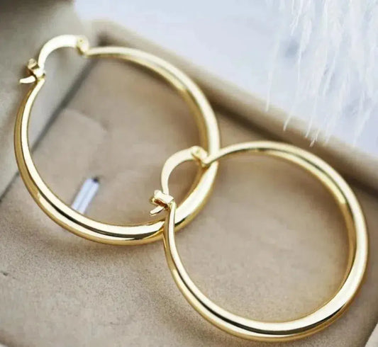 1+1 Offer: Large hoop earrings in gold