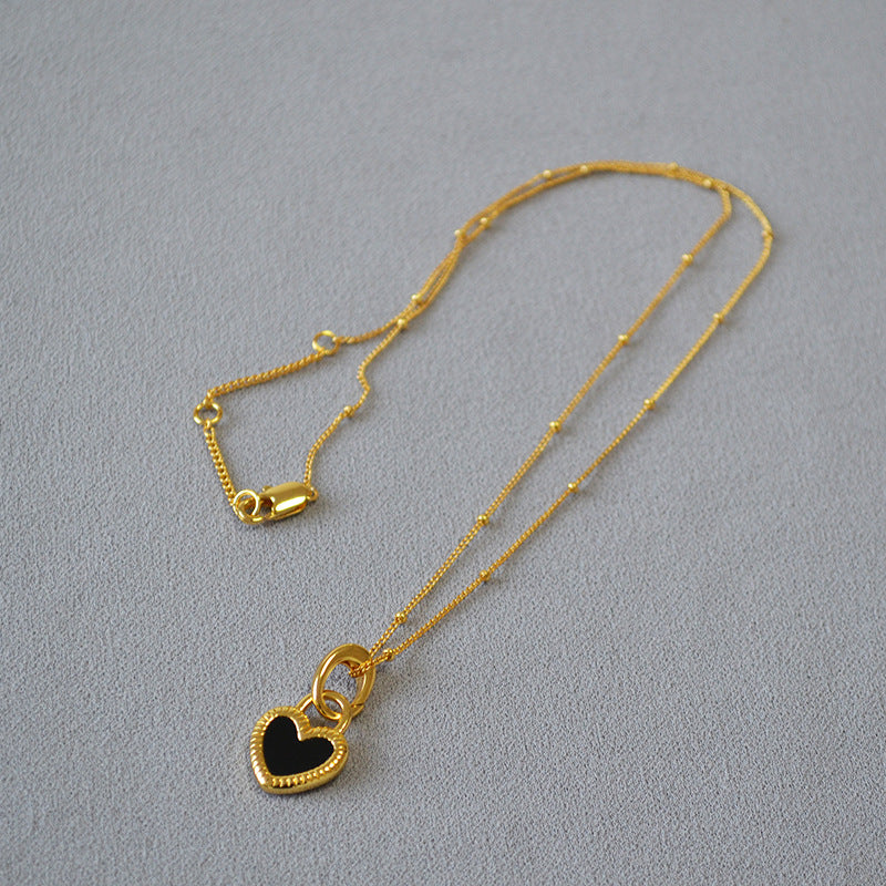 1+1 Offer: Black and White Heart Pendant Necklace in Gold