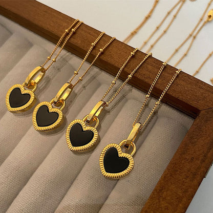 1+1 Offer: Black and White Heart Pendant Necklace in Gold
