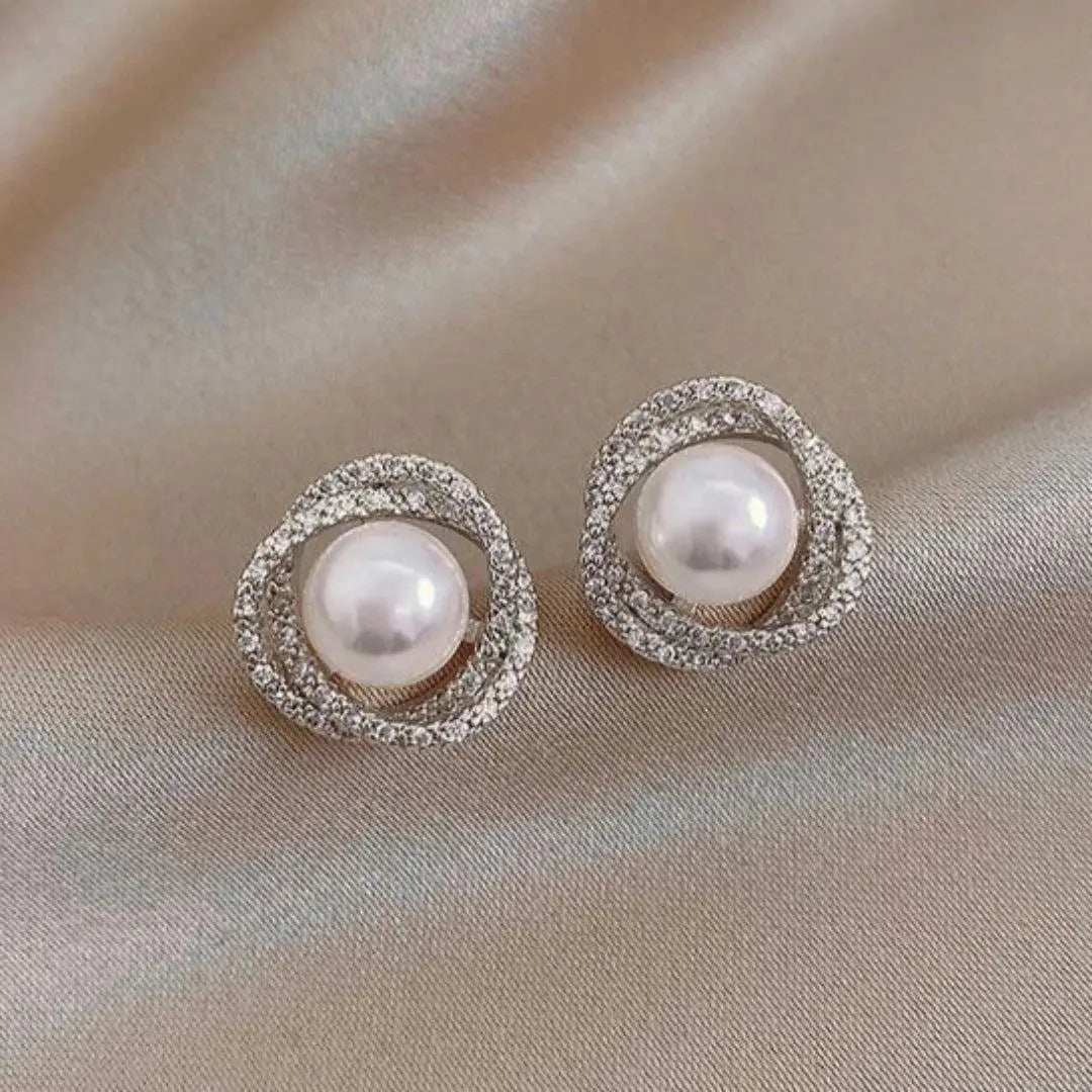 1+1 Offer: Shiny spiral earrings with elegant pearls