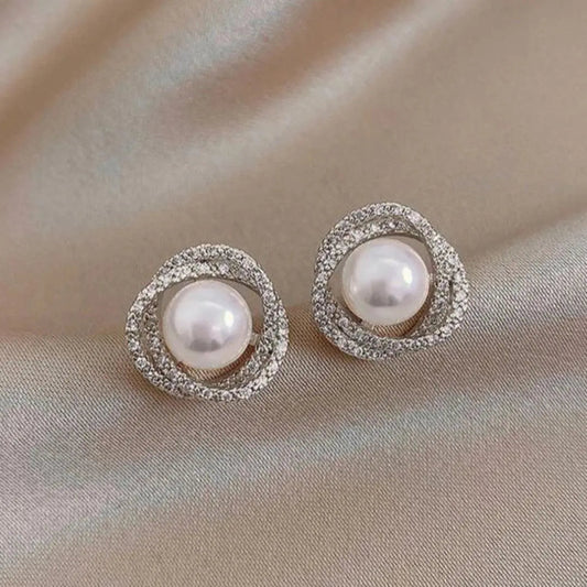 1+1 Offer: Shiny spiral earrings with elegant pearls