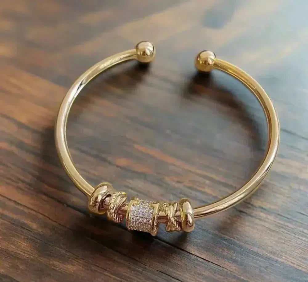 1+1 Offer: Adjustable bracelet with golden charms
