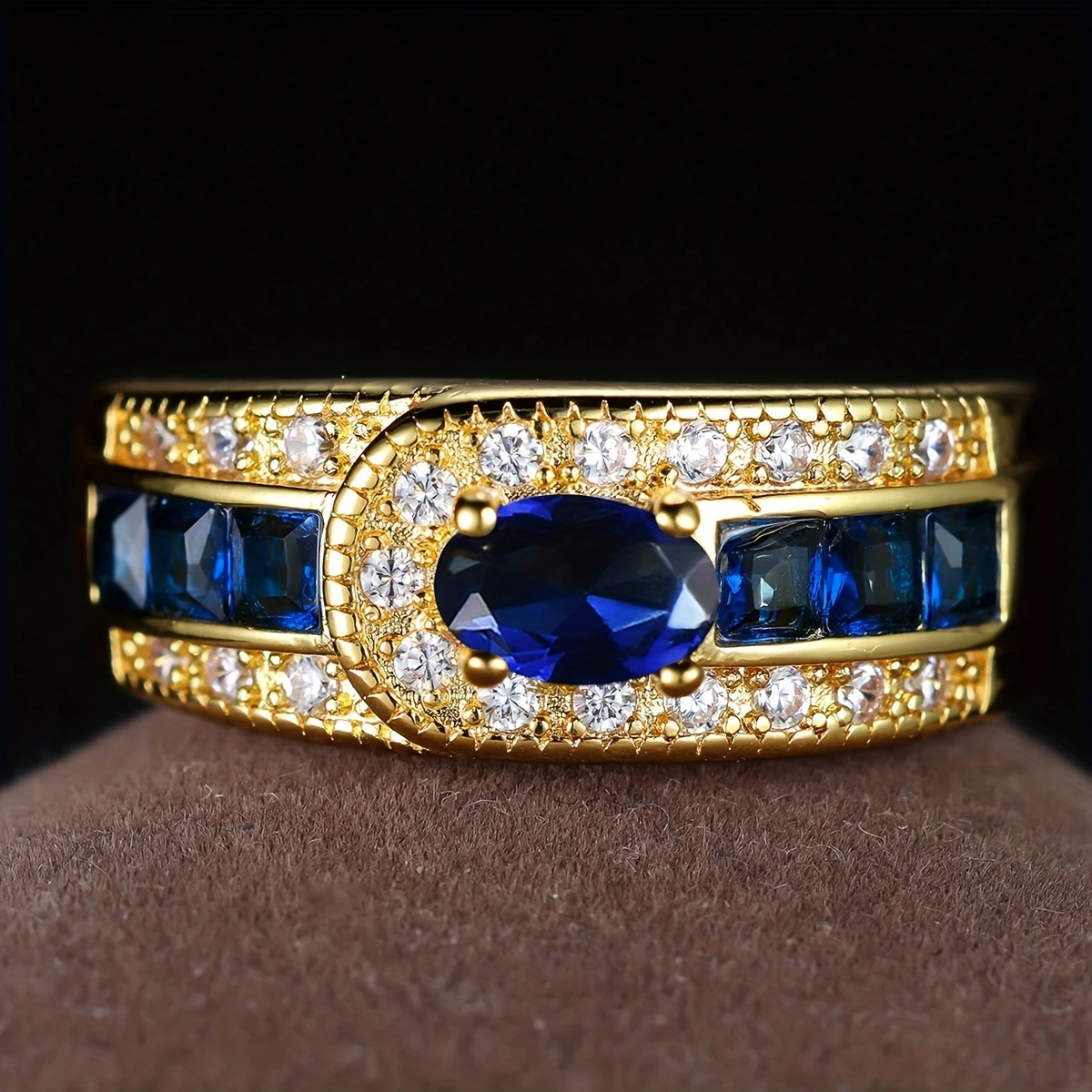 Vintage gold ring with zirconia and blue stones