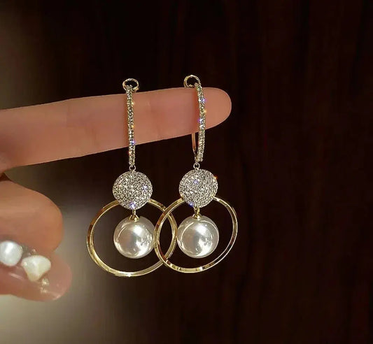 Luxury earrings with cultured pearls and zircons